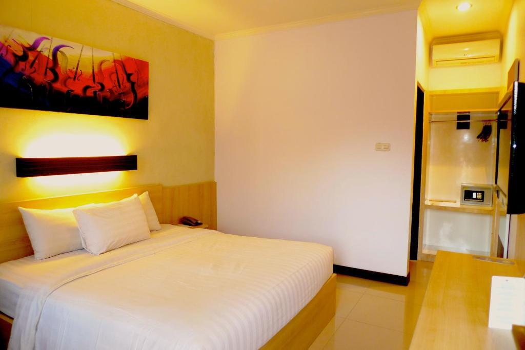 Palloma Hotel Kuta Кута Стая снимка